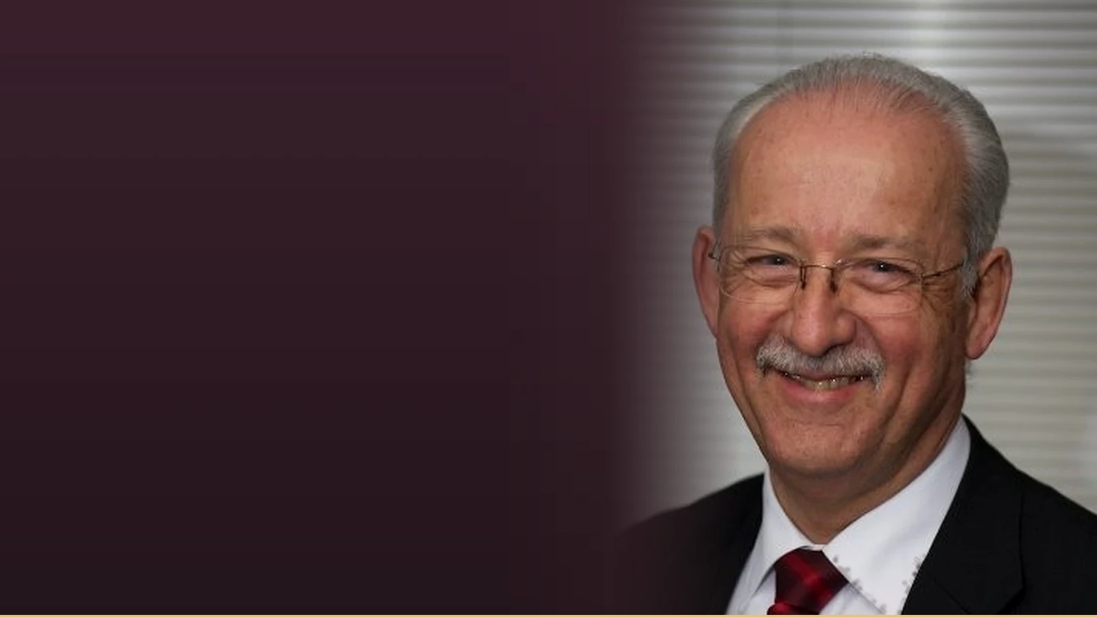 Steve Sutherland-Tomey, an instructional designer with experience in automotive training, smiles for the camera.